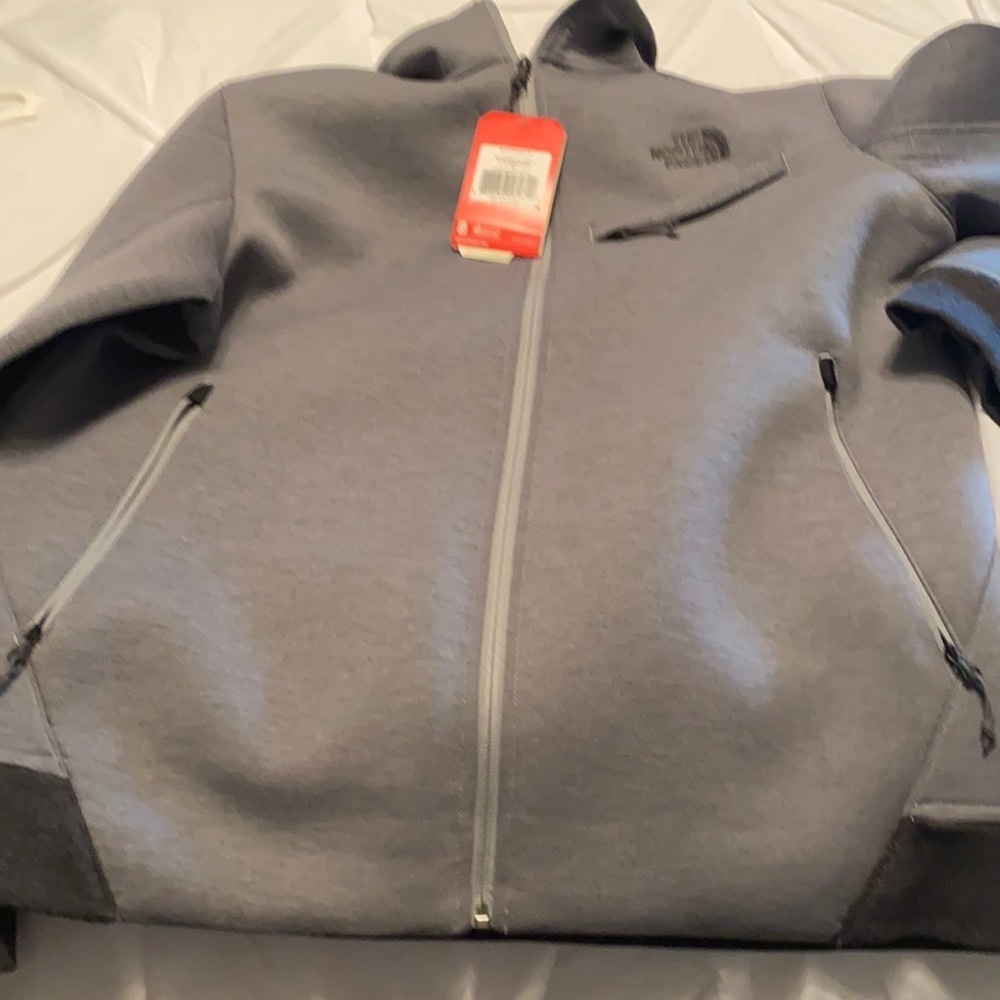 Brand new nice jacket to small for my husband